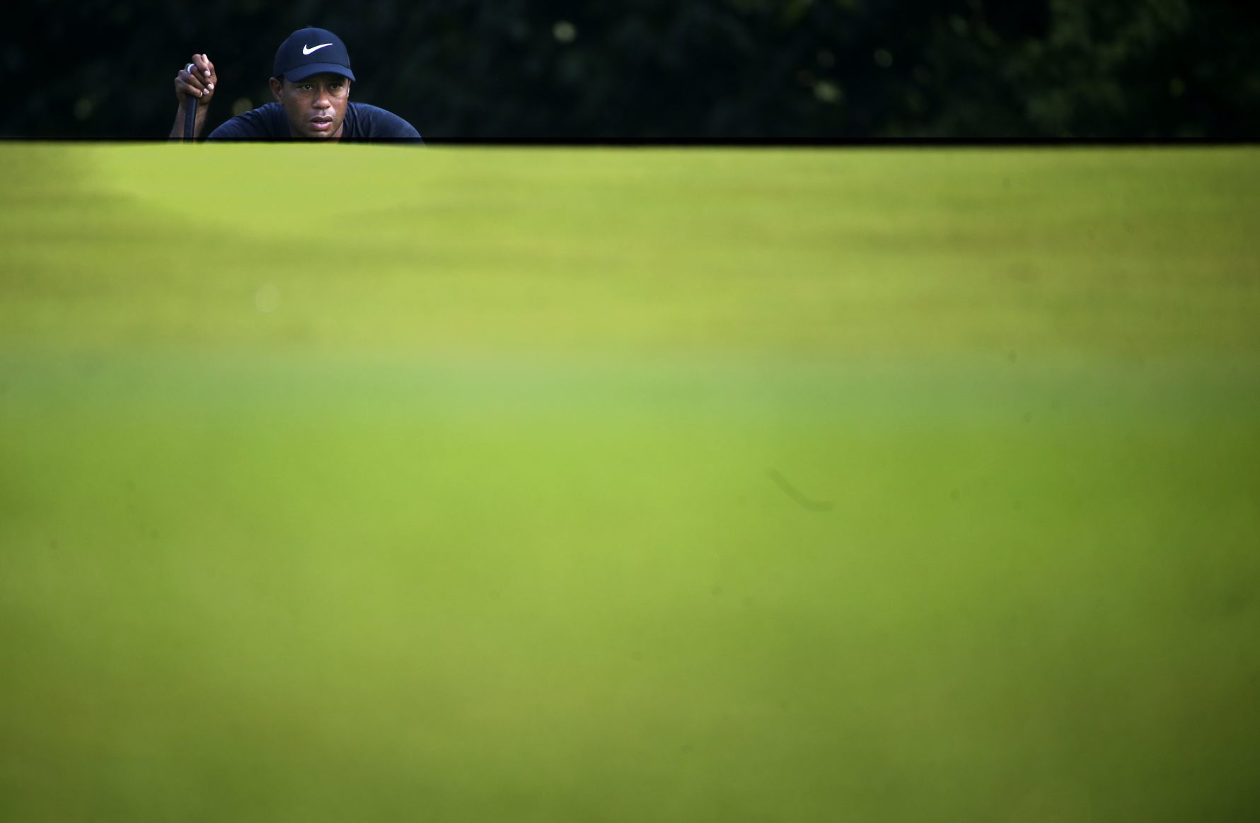 Rain-delayed second round continues of the 100th PGA Championship